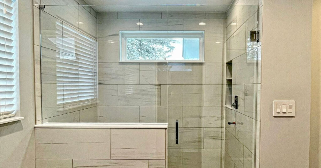A photo of a Frameless Pivot Glass Shower Doors installed by professionals.